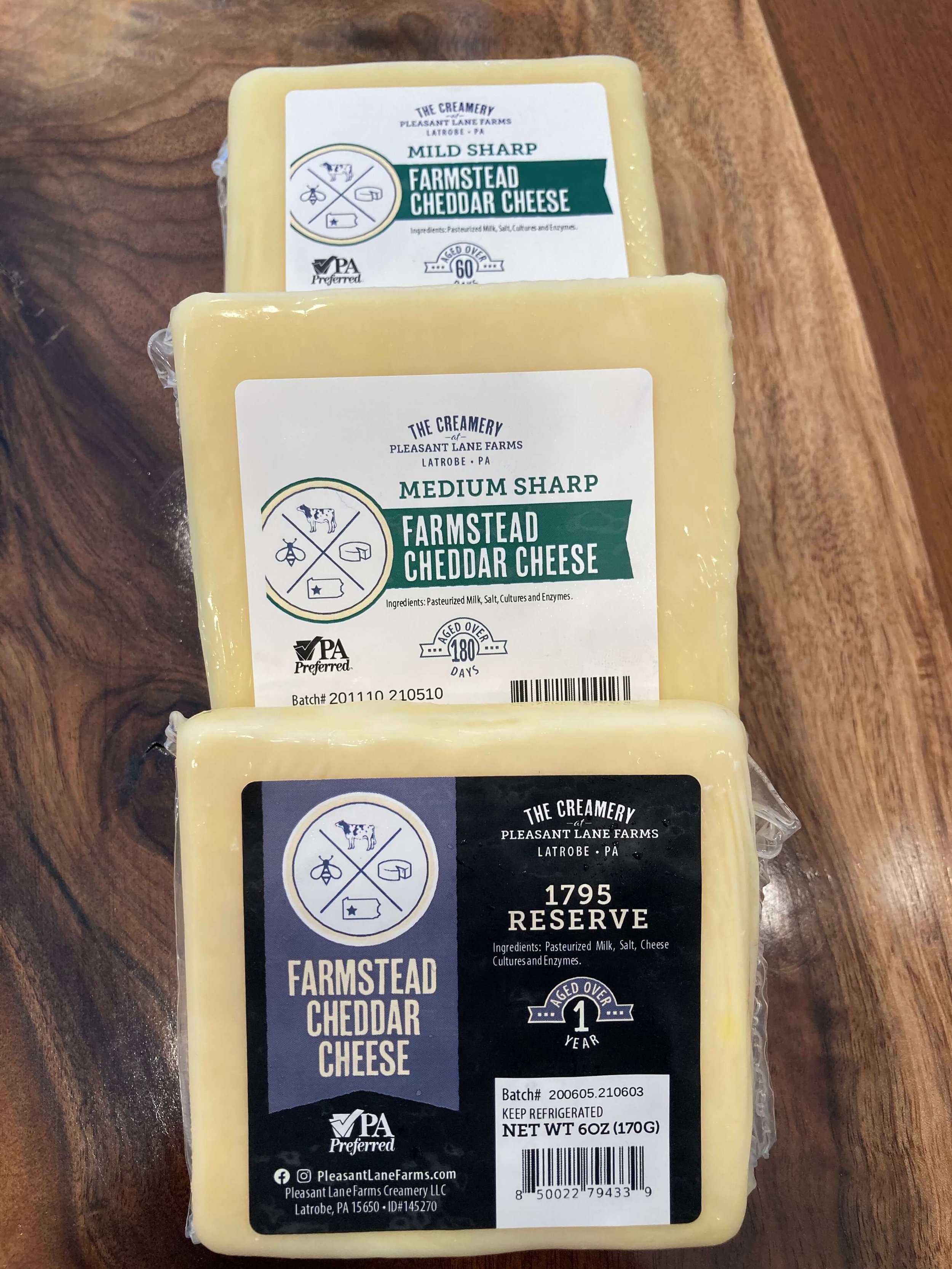 Quesos Cheddar de Pleasant Lane Farms